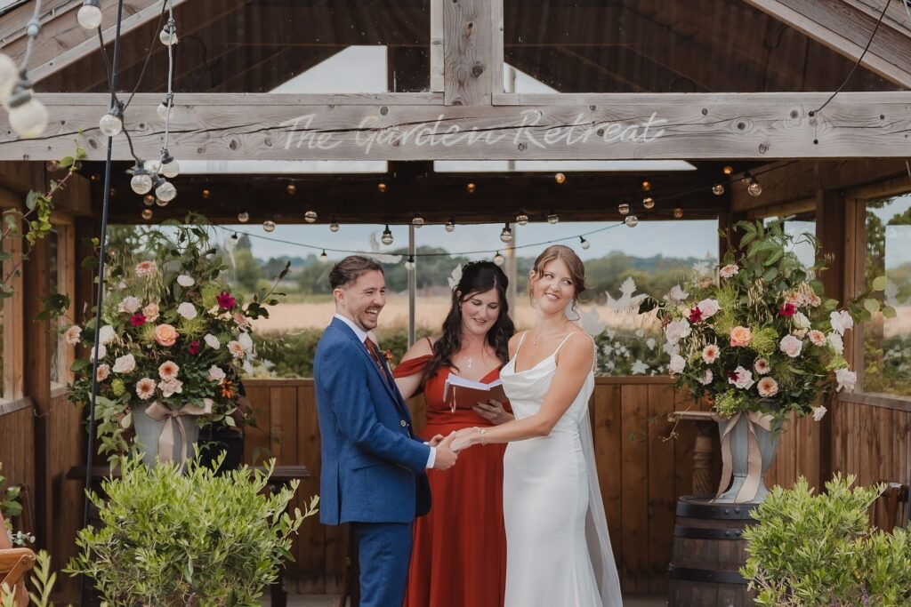 Eleanor Bryan acts as the officiant at a wedding.