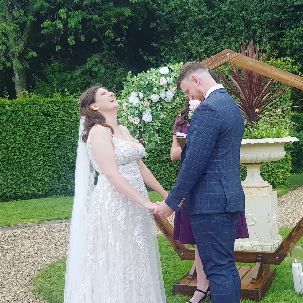 A bride and groom getting married.
