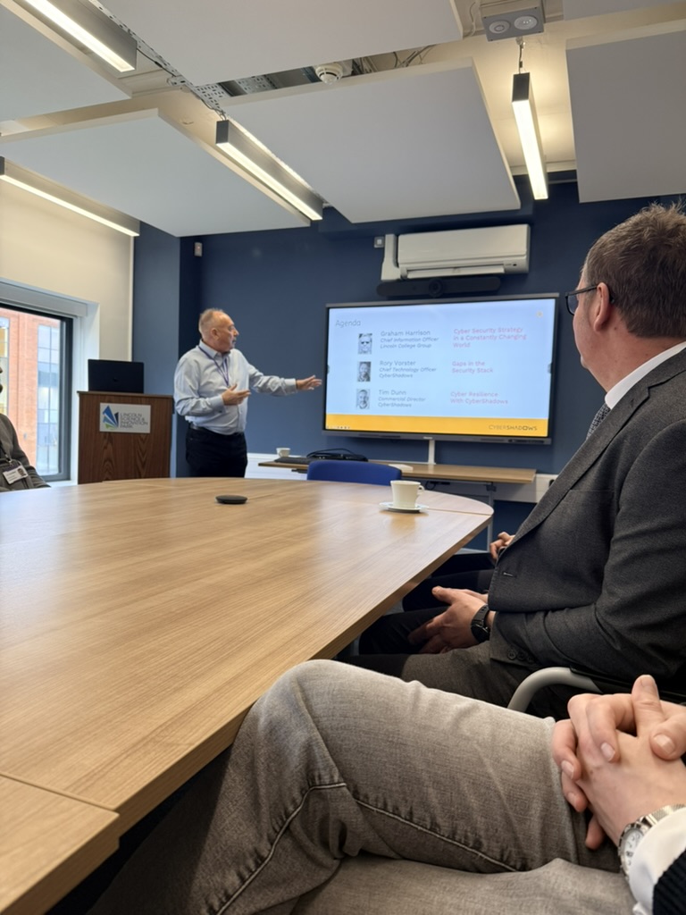 Neil Everatt giving a presentation at the CyberShadows launch party.