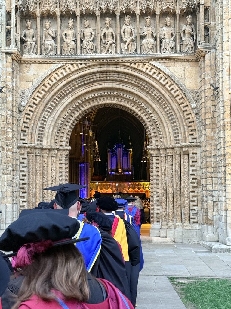 The doors opening for the academic procession at the 2026 University of Lincoln graduation ceremony.