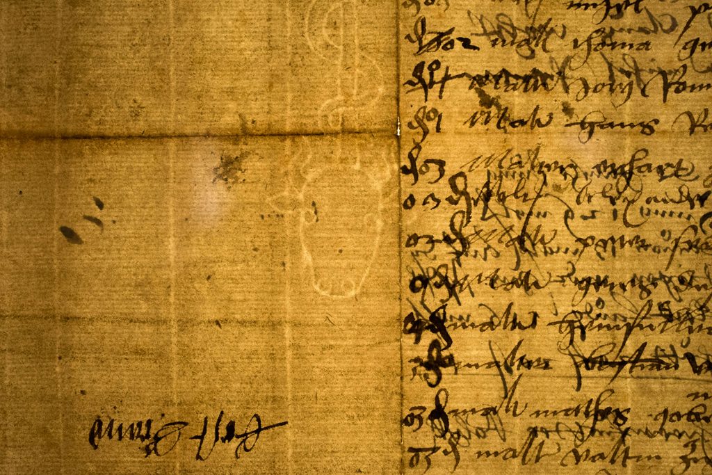 An old watermark on a piece of parchment.